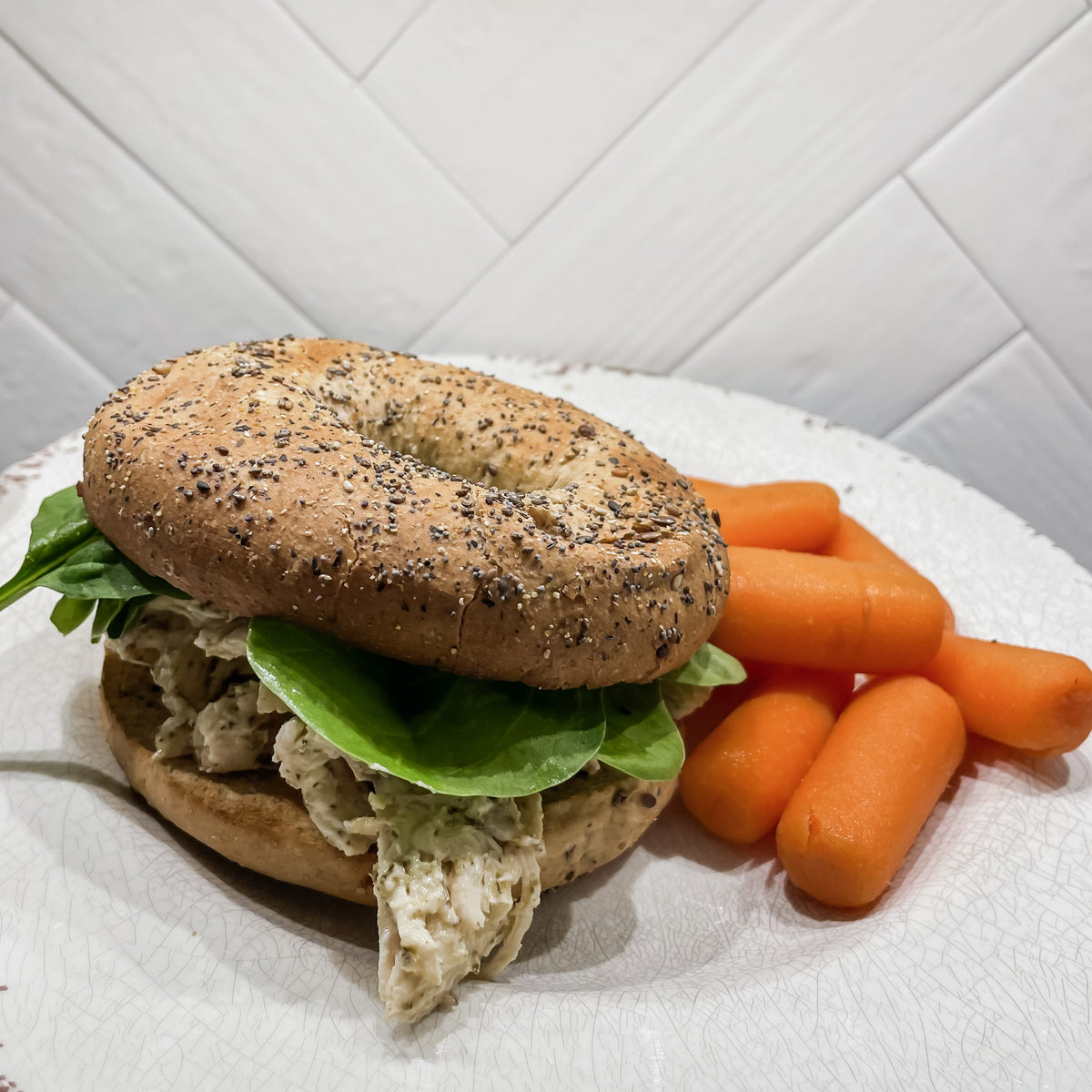 Pesto Chicken Salad Bagel with Carrots